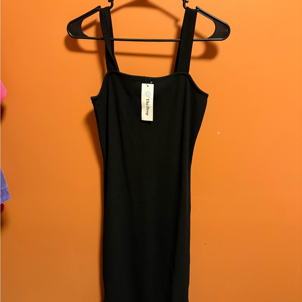 Chic Black Mini Dress with Sleek Design